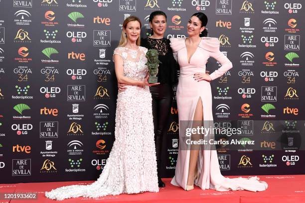Maria Esteve, Tamara Flores and Celia Flores hold the Honorary Award to tribute their mother Marisol during the 34rd edition of the Goya Cinema...