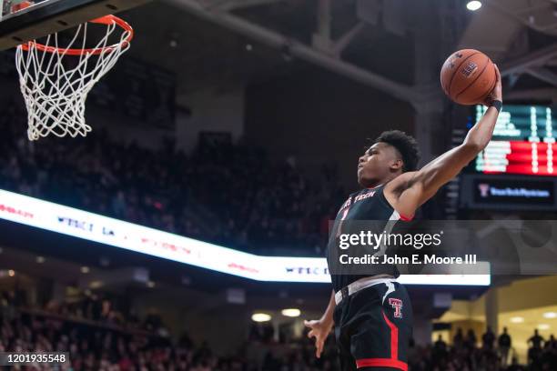 Guard Terrence Shannon Jr. #1 of the Texas Tech Red Raiders dunks the ball during the first half of the college basketball game against the Kentucky...
