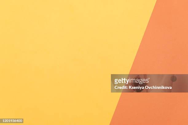paper color yellow, orange abstract background. - hintergrund papier orange stock-fotos und bilder