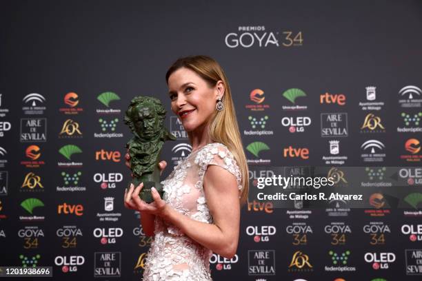 Maria Esteve holds the Honorary Award to tribute her mother Marisol during the 34rd edition of the Goya Cinema Awards at Jose Maria Martin Carpena...