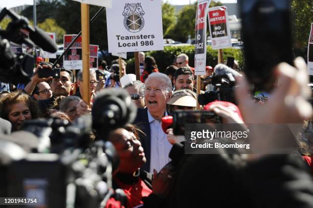 Former Vice President Joe Biden, 2020 Democratic presidential candidate, center, walks in the picket line with Culinary Workers Union Local 226...