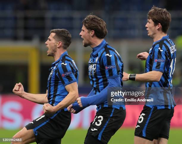 Remo Freuler of Atalanta BC celebrates his goal with his team-mates Hans Hateboer and Marten De Roon during the UEFA Champions League round of 16...