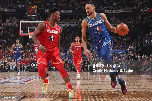 Ben Simmons of Team LeBron handles the ball while Jimmy Butler of Team Giannis plays defense during the 69th NBA All-Star Game on February 16, 2020...