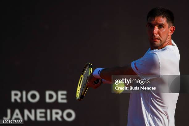 Federico Delbonis of Argentina returns a shot to Cristian Garin of Chile during the ATP Rio Open 2020 at Jockey Club Brasileiro on February 19, 2020...