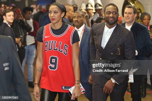 Candace Parker of the Los Angeles Sparks walks with NBA Legend Dwyane Wade during the 69th NBA All-Star Game as part of 2020 NBA All-Star Weekend on...