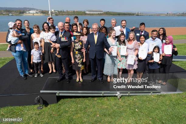 Australian Governor General David Hurley, Linda Hurley and Australian Prime Minister Scott Morrison pose for a photo with new Australian citizens...