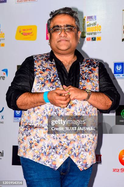 In this picture taken on February 19 singer Kunal Ganjawala poses for photographs as he arrives at the '12th Radio Mirchi Music Awards 2020' in...