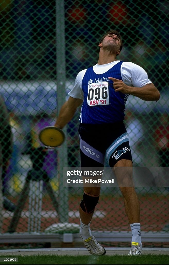 Lars Riedel of Germany in action during the Discus Throw event of the ...