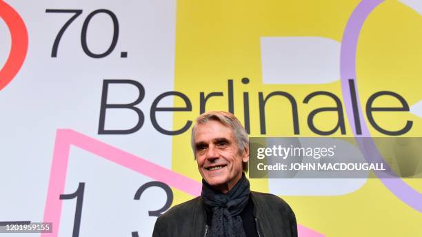 President of the International Jury Jeremy Irons smiles during a press conference on February 20 on the day of the official opening of the 70th...