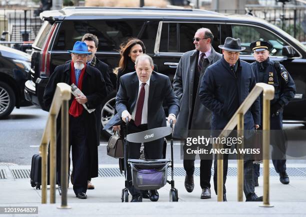 Harvey Weinstein arrives at Manhattan Supreme Court February 20, 2020 with his legal team for the third day of jury deliberations in his sex assault...