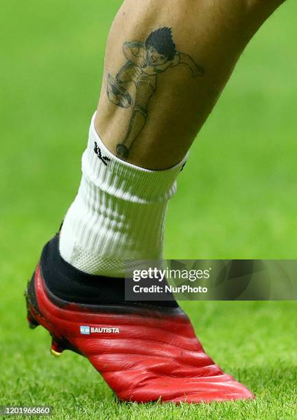 The costumised shoes of Alejandro Gomez of Atalanta in honour of his son and his Holly and Benji cartoon tattoo on the right calf during the UEFA...