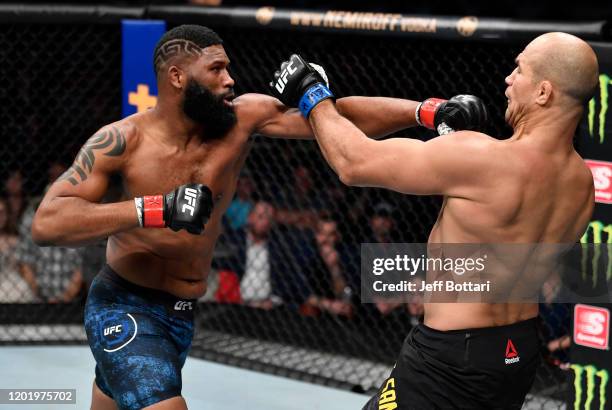 Curtis Blaydes punches Junior Dos Santos of Brazil in their heavyweight fight during the UFC Fight Night event at PNC Arena on January 25, 2020 in...