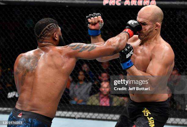 Curtis Blaydes punches Junior Dos Santos of Brazil in their heavyweight fight during the UFC Fight Night event at PNC Arena on January 25, 2020 in...