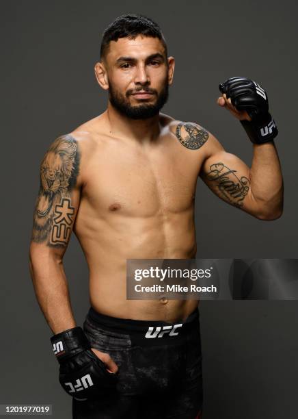 Alex Perez poses for a portrait backstage after his victory during the UFC Fight Night event at PNC Arena on January 25, 2020 in Raleigh, North...