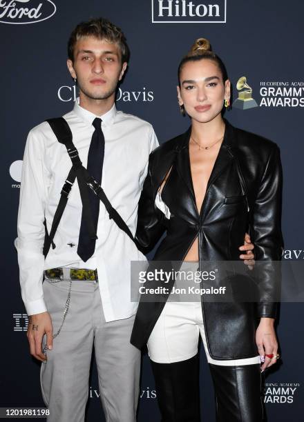 Anwar Hadid and Dua Lipa attend the Pre-GRAMMY Gala and GRAMMY Salute to Industry Icons Honoring Sean "Diddy" Combs at The Beverly Hilton Hotel on...