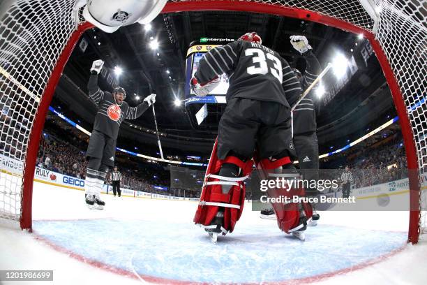 Goaltender David Rittich of the Calgary Flames and teammates celebrate in the game between Atlantic Division v Pacific Division during the 2020 Honda...