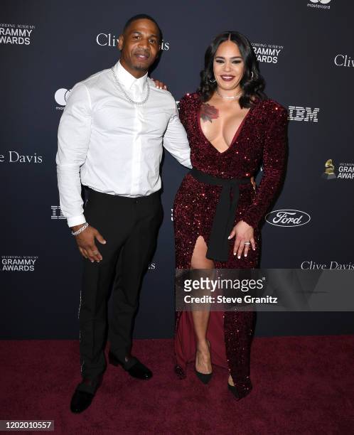 Stevie J and Faith Evans arrives at the Pre-GRAMMY Gala and GRAMMY Salute to Industry Icons Honoring Sean "Diddy" Combs at The Beverly Hilton Hotel...