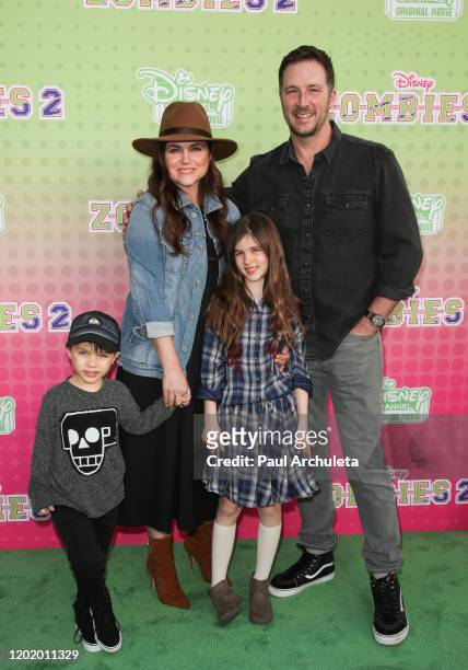 Tiffani Thiessen and her Husband Brady Smith with their kids attend the screening of the Disney Channel original movie "ZOMBIES 2" at Walt Disney...