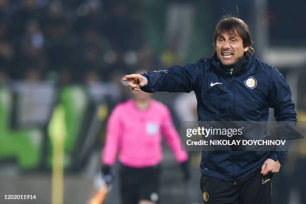 Inter Milan's Italian head coach Antonio Conte reacts during the UEFA Europa League round of 32 first leg football match between PFC Ludogorets 1945...