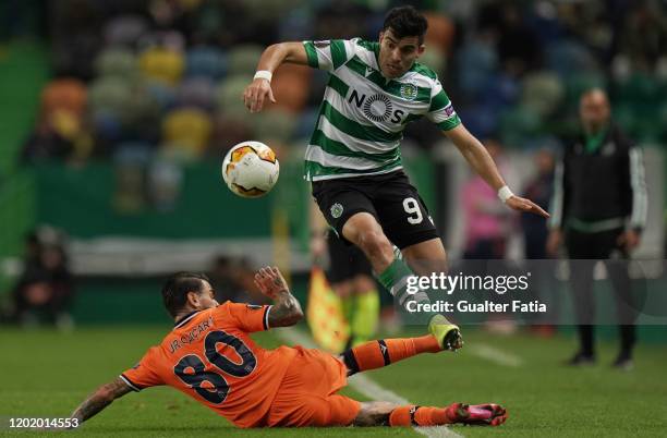 Marcos Acuna of Sporting CP with Junior Caicara of Istanbul Basaksehir in action during the UEFA Europa League Round of 32 - First Leg match between...