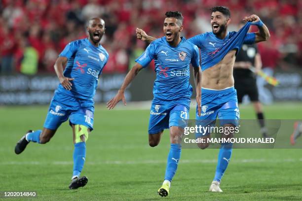 Zamalek SC's players celebrate after winning the Egyptian Super Cup final football match against Ahly SC at Mohammed Bin Zayed stadium in Abu Dhabi...