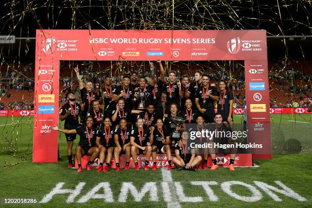 New Zealand men and women players celebrate after winning their respective Cup Finals during the 2020 HSBC Sevens at FMG Stadium Waikato on January...