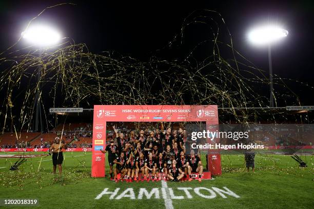 New Zealand men and women players celebrate after winning their respective Cup Finals during the 2020 HSBC Sevens at FMG Stadium Waikato on January...