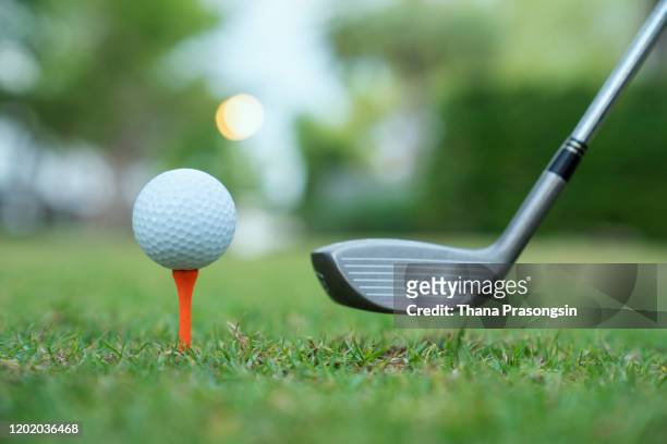 putting the drive in the ball - driving range stock pictures, royalty-free photos & images