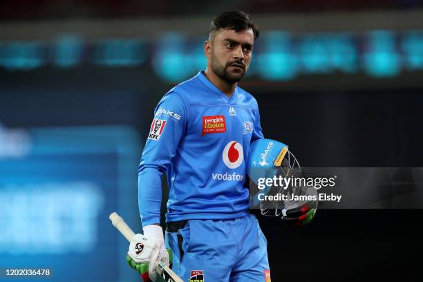 Rashid Khan of the Adelaide Strikers reacts after losing his wicket during the Big Bash League match between the Adelaide Strikers and the Hobart...