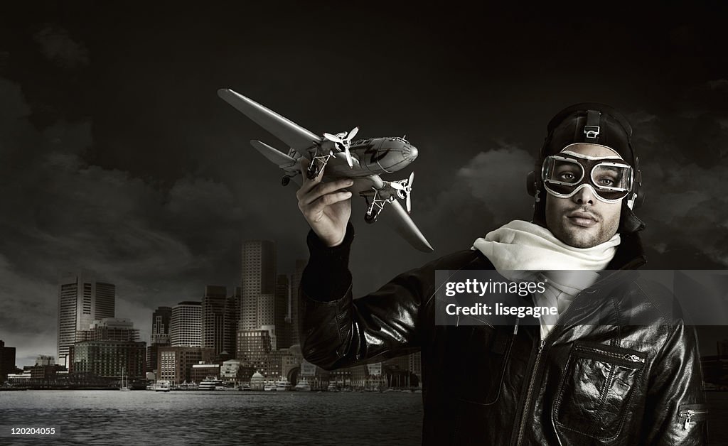 Man playing with airplane