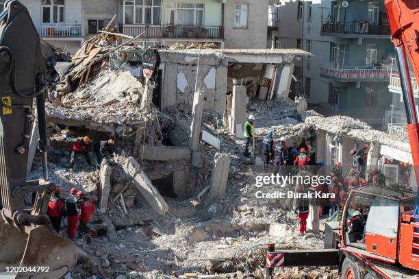 Rescue workers work at the scene of a collapsed building on January 26, 2020 in Elazig, Turkey. The 6.8-magnitude earthquake injured more than 1600...