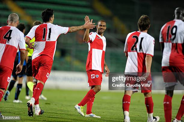 Alejandro Faurlin of QPR celebrates with Kieron Dyer after scoring during the Trofeo Bortolotti match between Queens Park Rangers and SC Braga at...