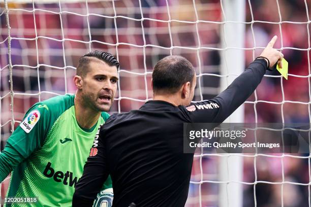 Referee Mateu Lahoz sends off Ivan Cuellar of CD Leganes for second yellow card during the Liga match between Club Atletico de Madrid and CD Leganes...