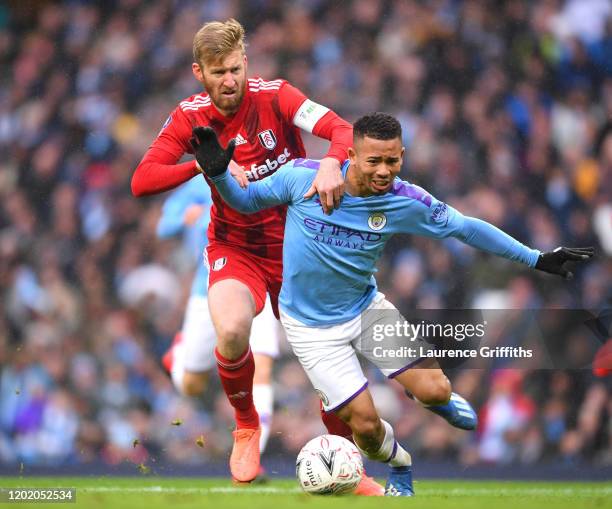 Tim Ream of Fulham fouls Gabriel Jesus of Manchester City leading to a penalty during the FA Cup Fourth Round match between Manchester City and...