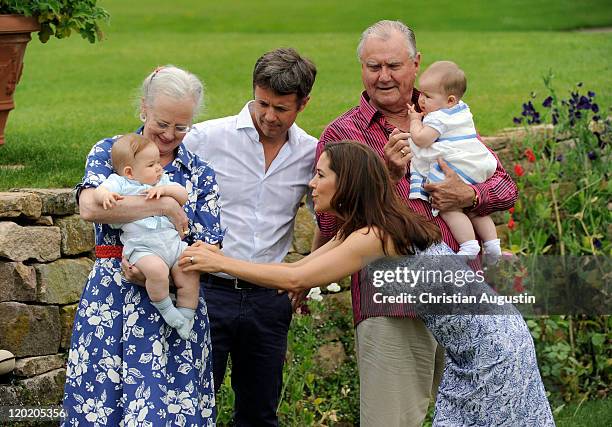 Queen Margrethe II, Prince Consort Henrik of Denmark, Crown Prince Frederik and Crown Princess Mary and the twins Vincent Frederik Minik Alexander...