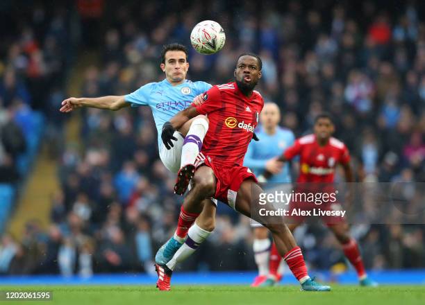 Eric Garcia of Manchester City and Josh Onomah of Fulham battle for the ball during the FA Cup Fourth Round match between Manchester City and Fulham...