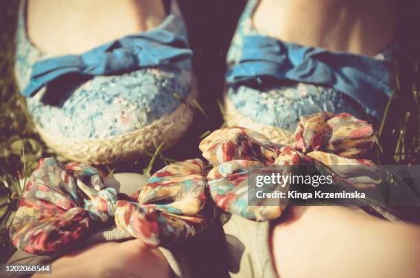 togetherness - girls shoes stock pictures, royalty-free photos & images