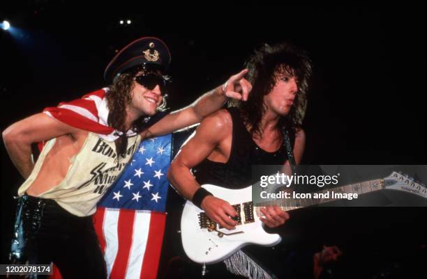 Lead guitarist Richie Sambora and lead vocalist and band namesake Jon Bon Jovi perform on June 22 at Hart Plaza in Detroit, MI.