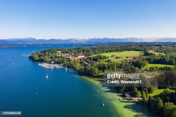germany, bavaria, bernried am starnberger see, aerial view of harbor on shore of lake starnberg with mountains in distant background - starnberger see stock pictures, royalty-free photos & images
