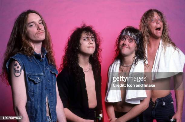 Bass guitarist Cliff Burton , guitarist Kirk Hammett, drummer Lars Ulrich and vocals, guitarist James Hetfield pose for a studio portrait during the...
