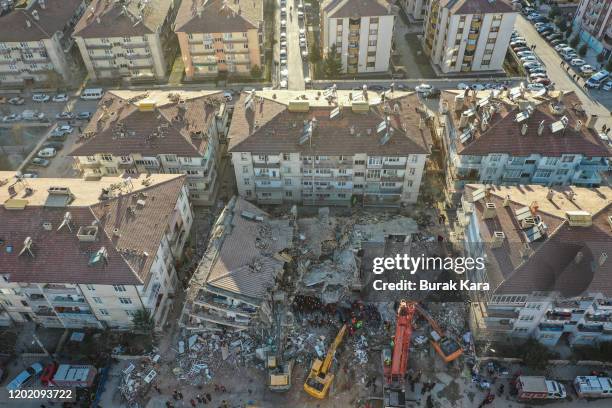 Rescue workers work at the scene of a collapsed building on January 26, 2020 in Elazig, Turkey. The 6.8-magnitude earthquake injured more than 1600...