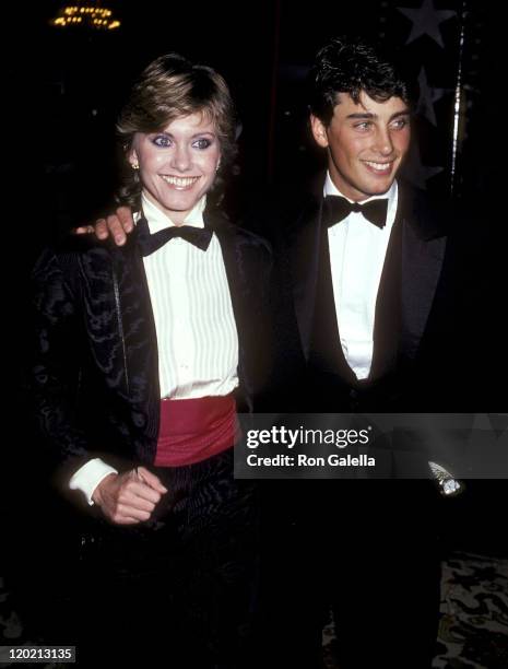 Singer Olivia Newton-John and boyfriend Matt Lattanzi attends the Ninth Annual American Film Institute Lifetime Achievement Award Salute to Fred...