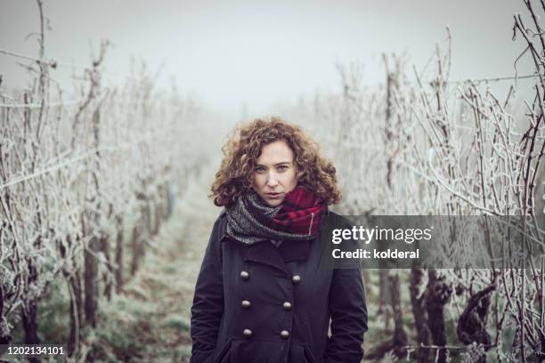 portrait of woman in vineyard - strasbourg winter stock pictures, royalty-free photos & images