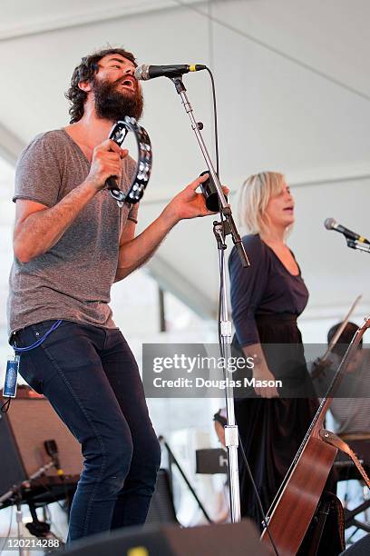 Jonathan Russell and Charity Rose Thielen of The Head and the Heart perform during the 2011 Newport Folk Festival at Fort Adams State Park on July...