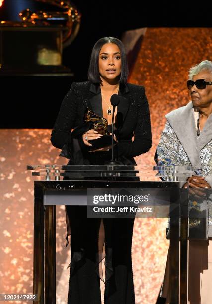 Lauren London, widow of the late rapper Nipsey Hussle, accepts Best Rap Performance for "Racks in the Middle" onstage during the 62nd Annual GRAMMY...