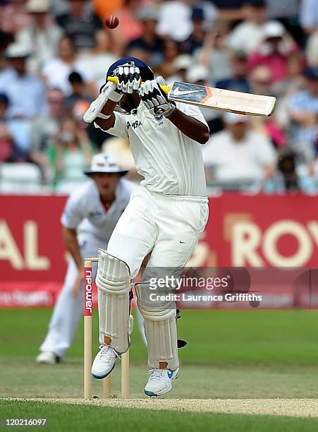 Abhinav Mukund of India edges the ball to Andrew Strauss of England off the bowling of Tim Bresnan during the second npower Test match between...