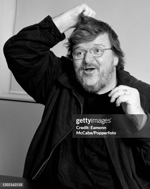 Michael Moore, American documentary filmmaker, circa November 2002. Moore came to international prominence with his 2002 documentary Bowling for...