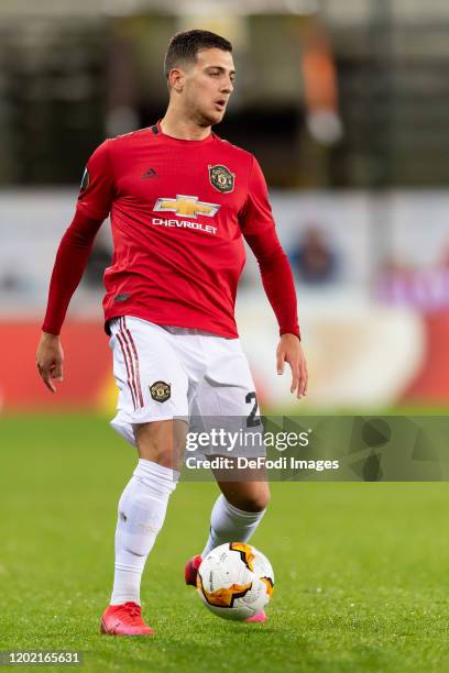 Diogo Dalot of Manchester United controls the ball during the UEFA Europa League round of 32 first leg match between Club Brugge and Manchester...