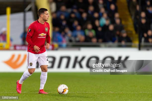 Diogo Dalot of Manchester United controls the ball during the UEFA Europa League round of 32 first leg match between Club Brugge and Manchester...