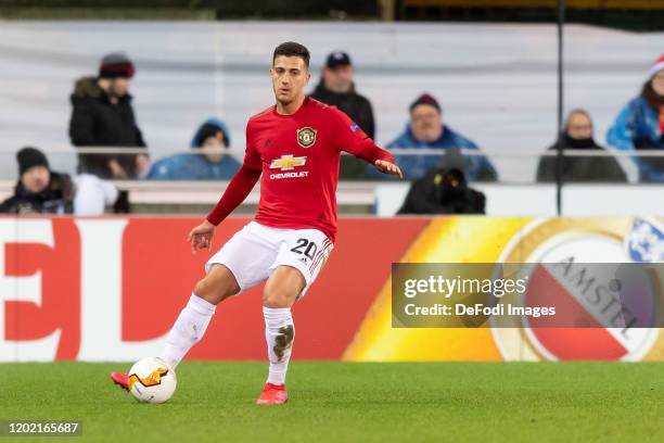 Diogo Dalot of Manchester United controls the ball during the UEFA Europa League round of 32 first leg match between Club Brugge and Manchester...